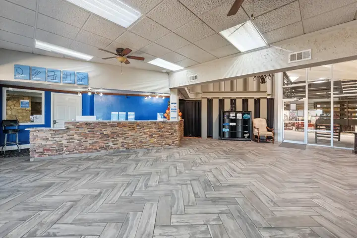 Front desk and lobby with herringbone floors